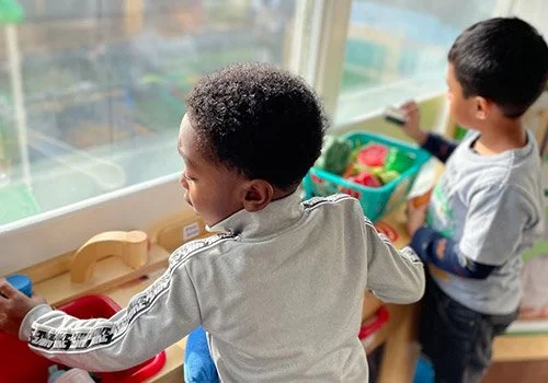 PNS Kids playing with toys