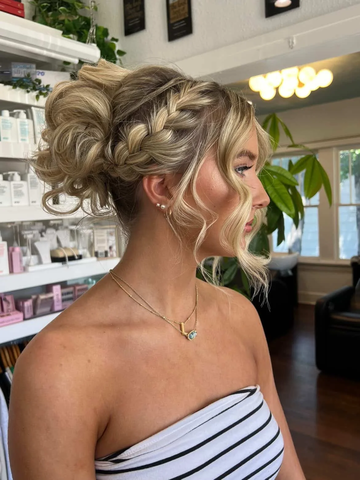 Prom-perfect updo ✨
 Pinned, polished, and ready for the dance floor.

The kind of hairstyle that stays put, photographs beautifully, and lets you feel like the main character all night long. Prom bookings are open, reserve your glam with us today! 
