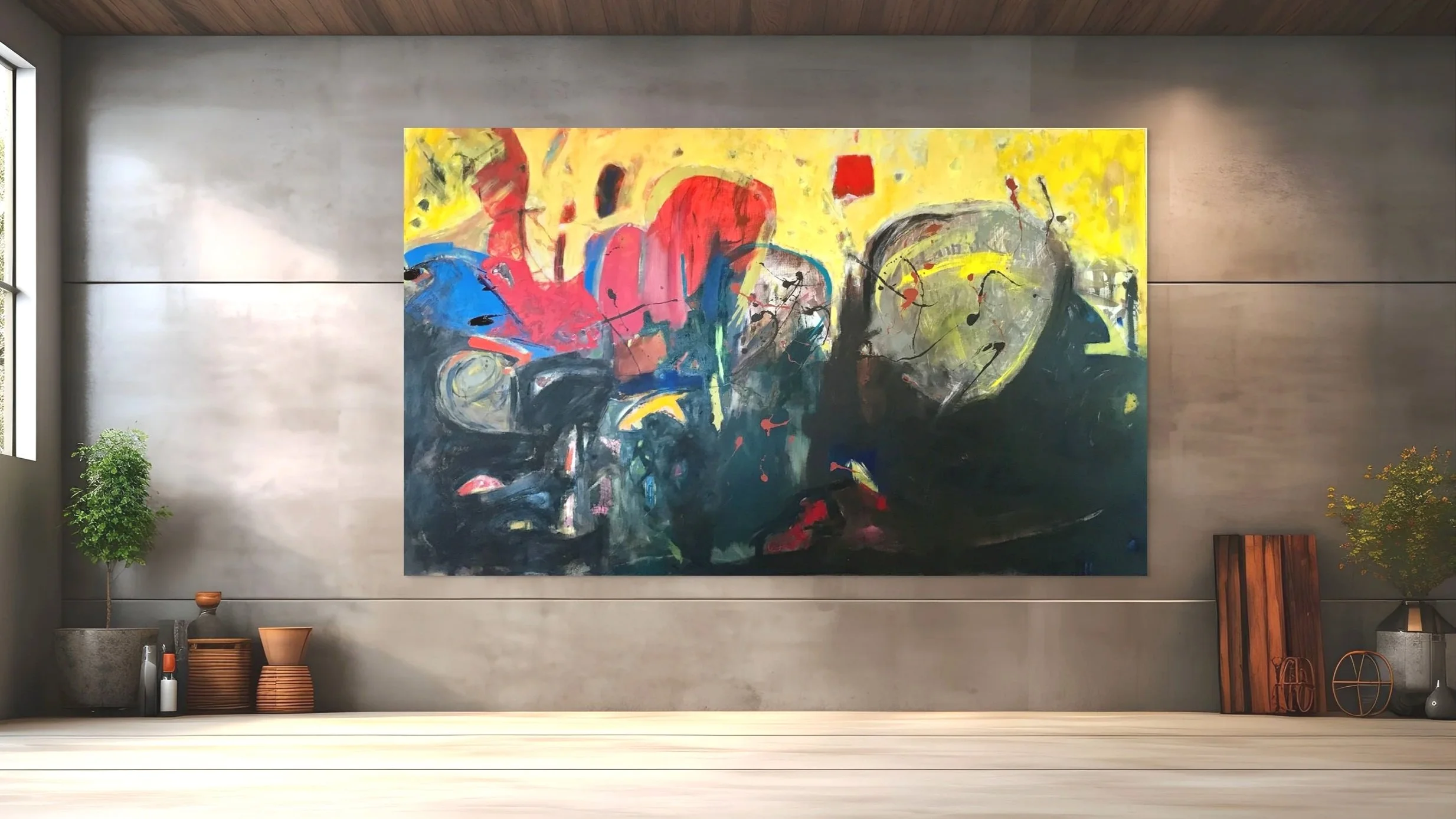 Abstract painting with red, blue, yellow, black, and gray colors hanging on a gray wall in a modern room with plants and decorative objects.