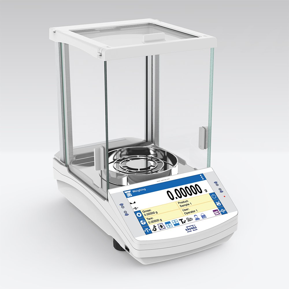 A digital analytical scale with a metal weighing pan and a glass enclosure, displaying a weight of zero grams.