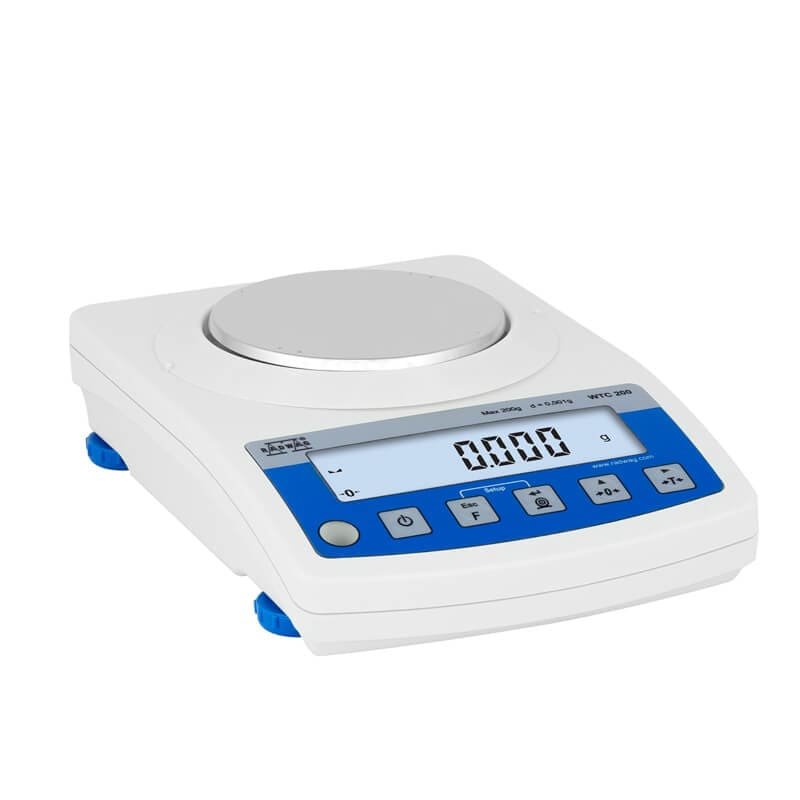 A digital laboratory weighing scale with a circular weighing platform and an LCD display showing a weight of 0.006 grams. The scale has blue buttons and is white in color.