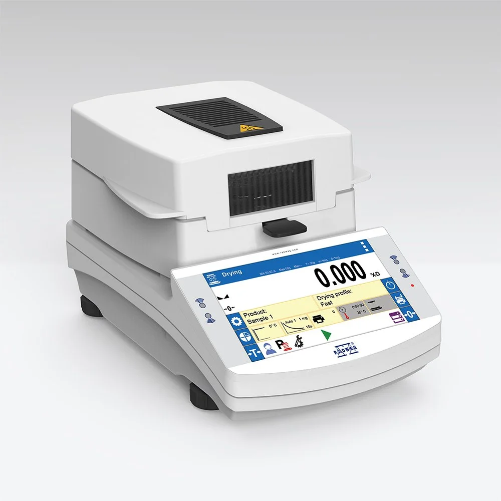 Laboratory drying instrument with a digital display and a sample holder on top.