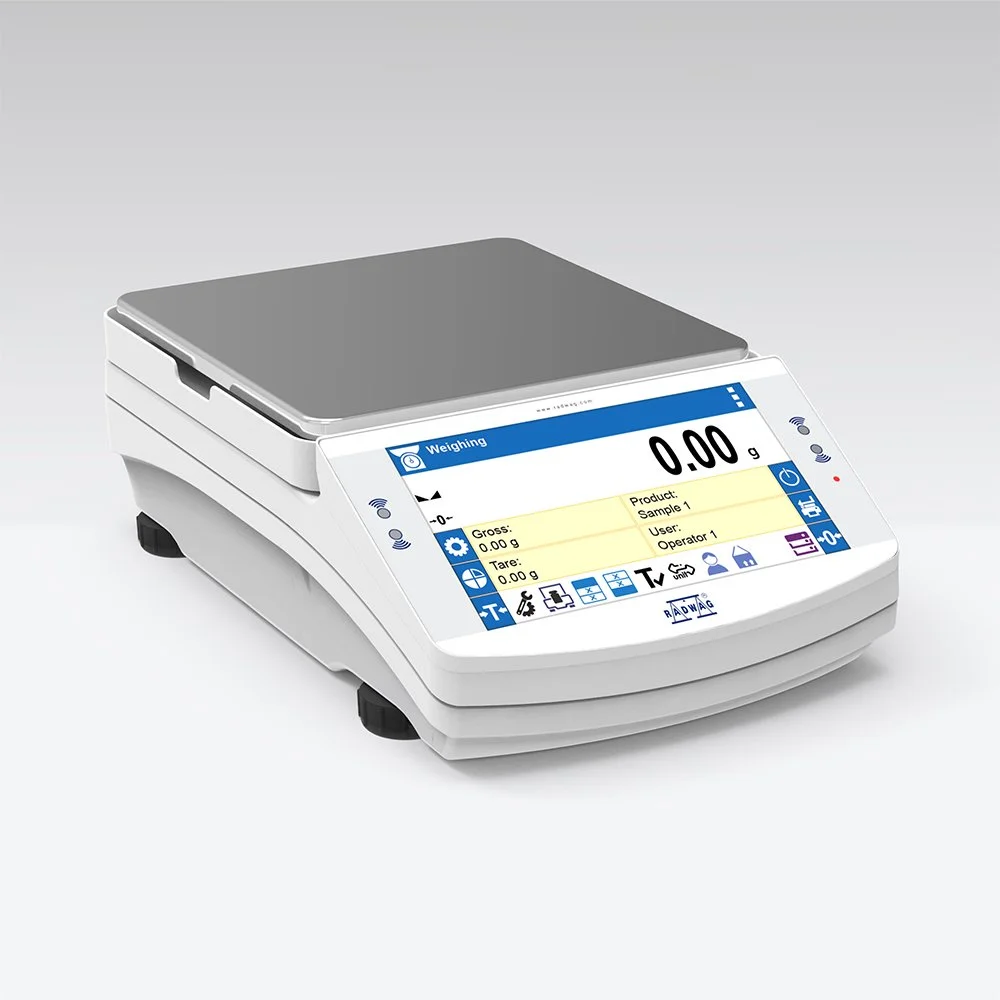Digital weighing scale with a small weighing platform and a colorful display screen showing 0.00 grams.