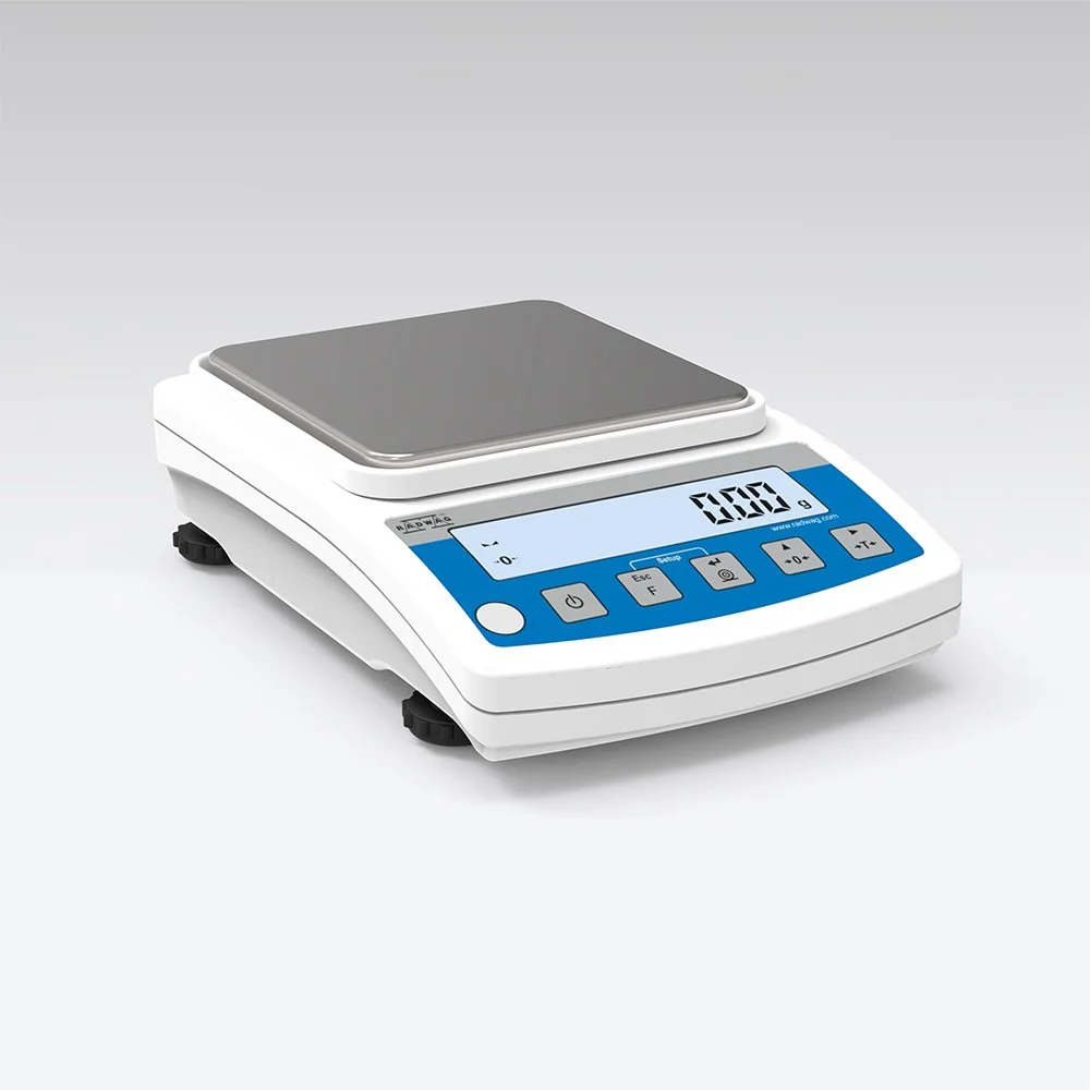 A digital kitchen scale with a metallic weighing platform and a digital display showing zero.