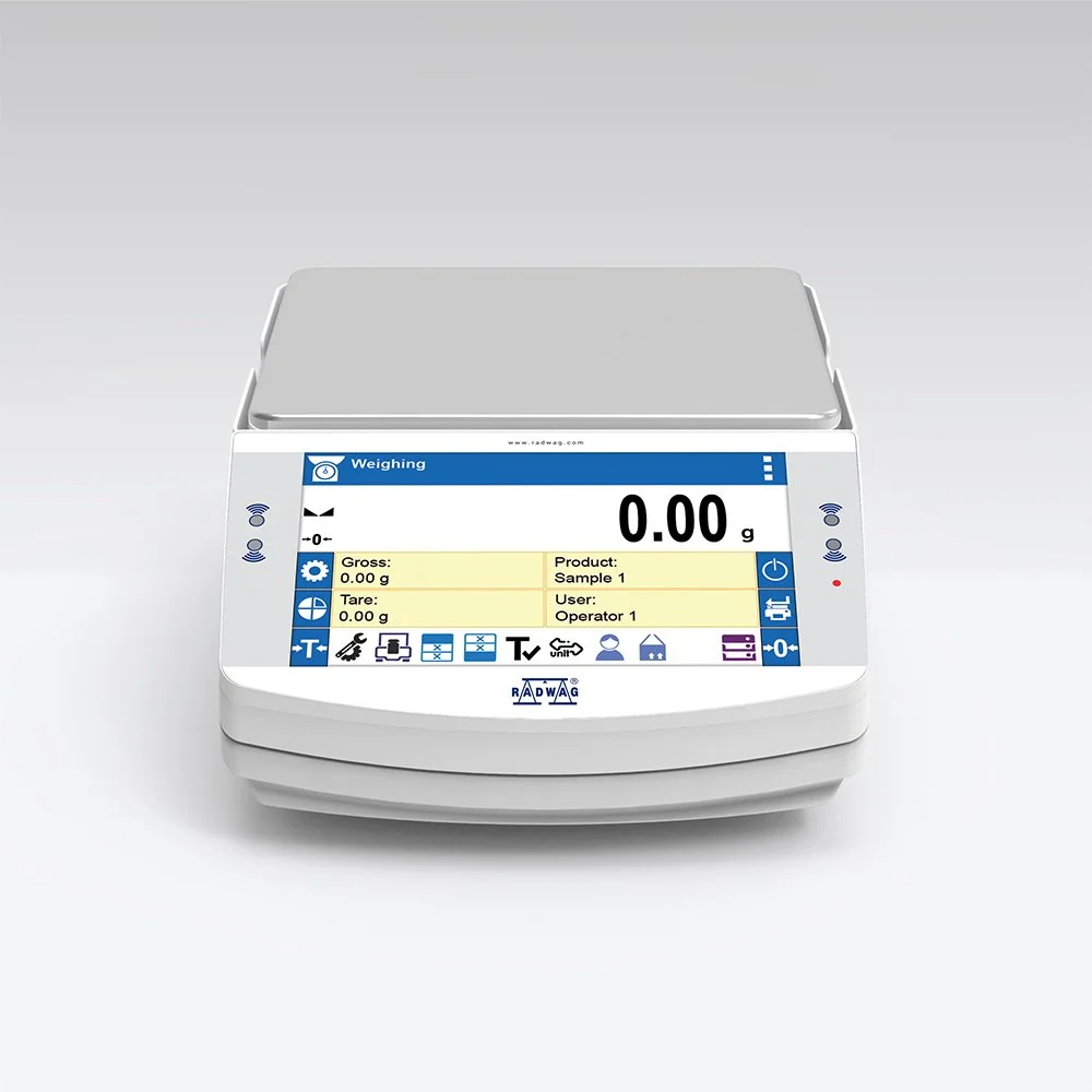 Digital weighing scale displaying 0.00 grams, with a clean, modern design and touchscreen interface.