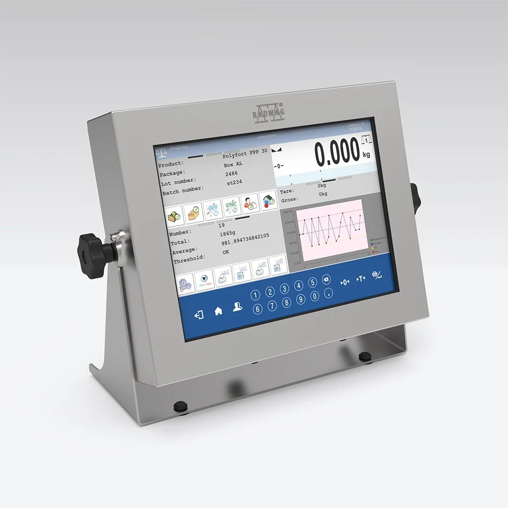 A digital scale or weighing device with a touchscreen display showing data, graphs, and icons related to product weight and quality control.