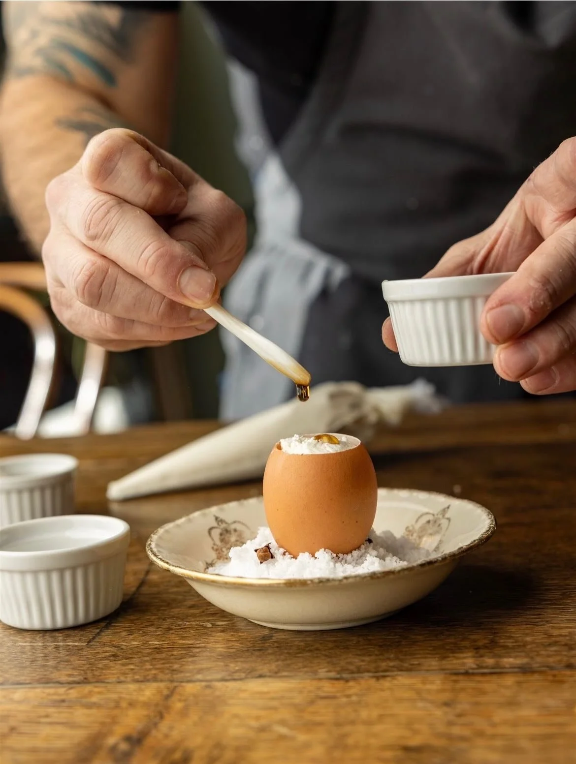 A peek into the kitchen as the chefs prepare a first course and main dish for our upcoming Mirroring the Masters of French Cuisine dinner.