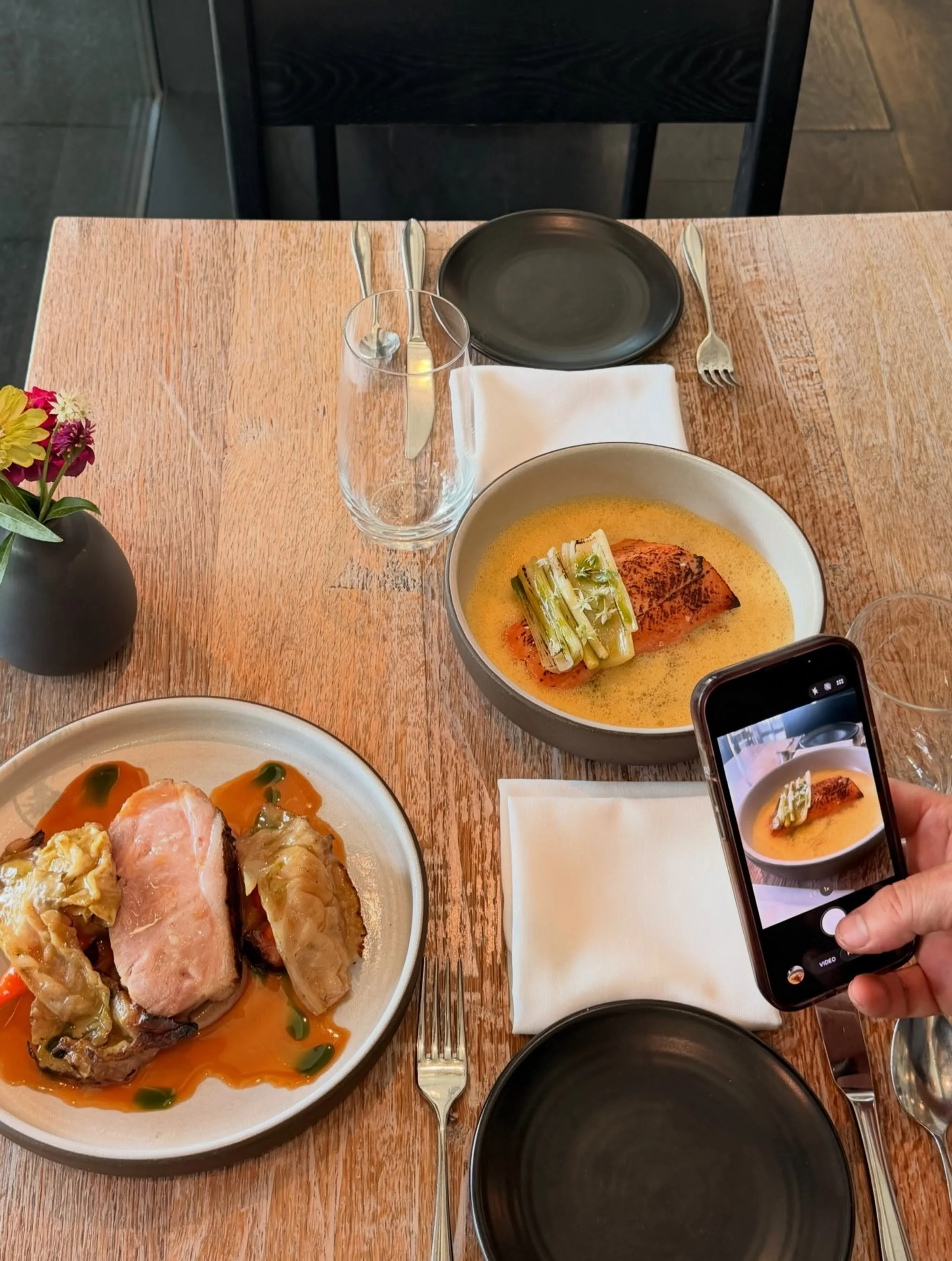 Caught @martinezaaronm snapping pics of our two new main course dishes 📸 switching things up as we head into late summer. 

Denver steaks ➡️ Roasted Pork Loin &amp; Belly
Smoked onion, apricot, cabbage, Habanada pepper vinaigrette 

Cod ➡️ Miso Cure