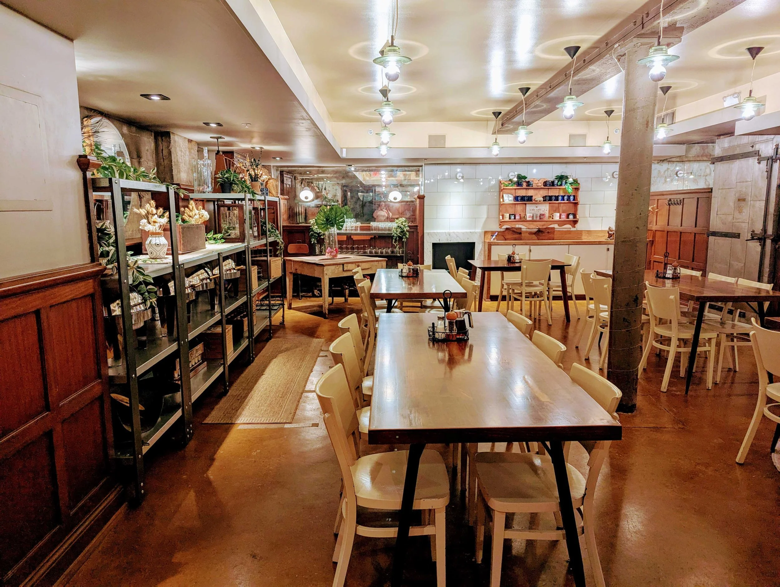 Our warmly lit cellar, tables and chairs set. 