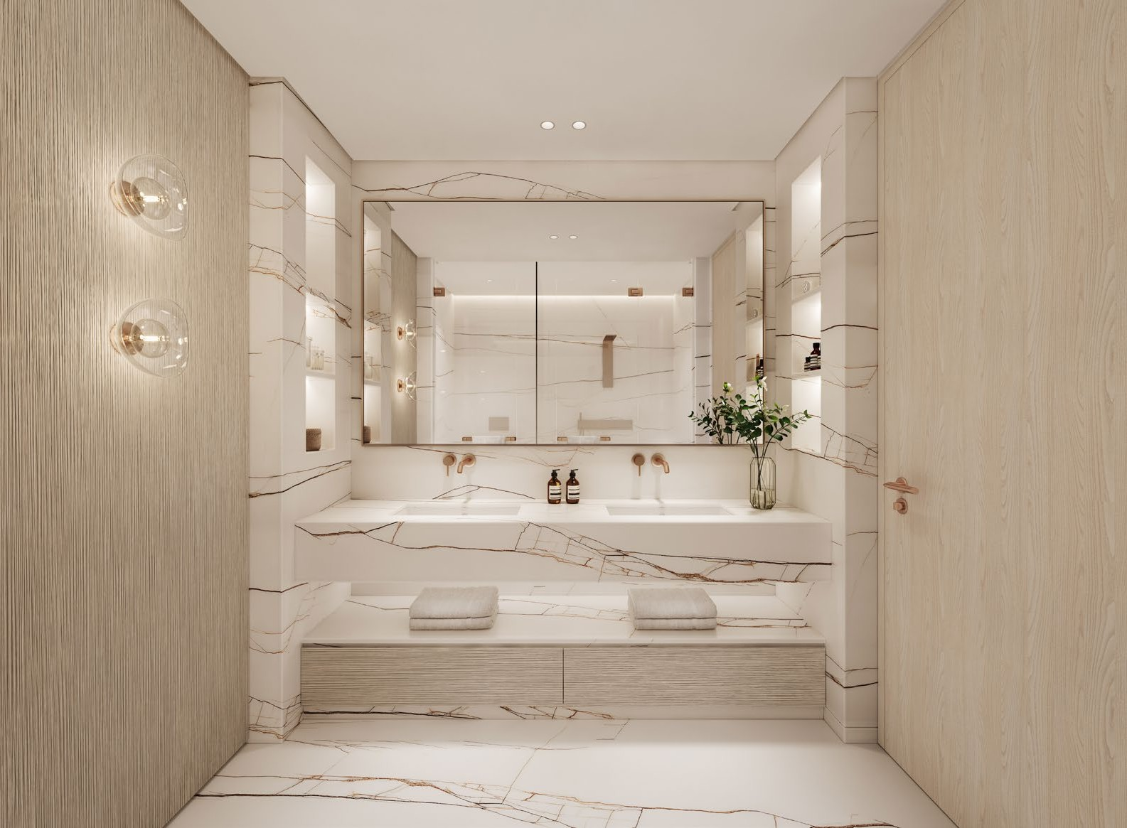 Modern bathroom with marble surfaces, large mirror, a double sink, and decorative lighting, featuring a vase with greenery.