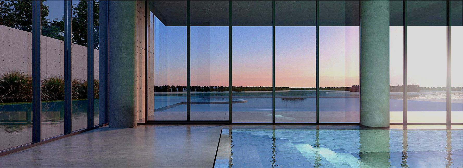 Modern indoor pool area with floor-to-ceiling windows overlooking a body of water and sunset sky, minimalistic design with concrete pillars.