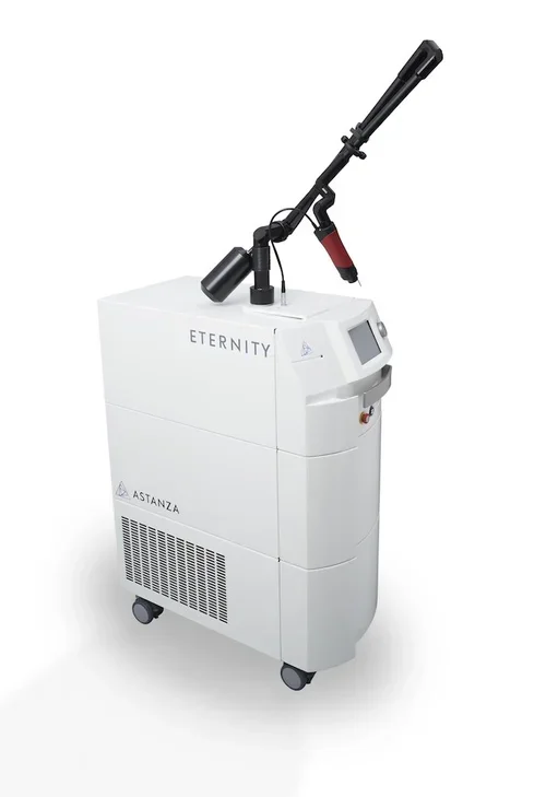 Medical device labeled 'ETERNITY' and 'ASTANZA' with a robotic arm and touchscreen interface, used for aesthetic or dermatological treatments.