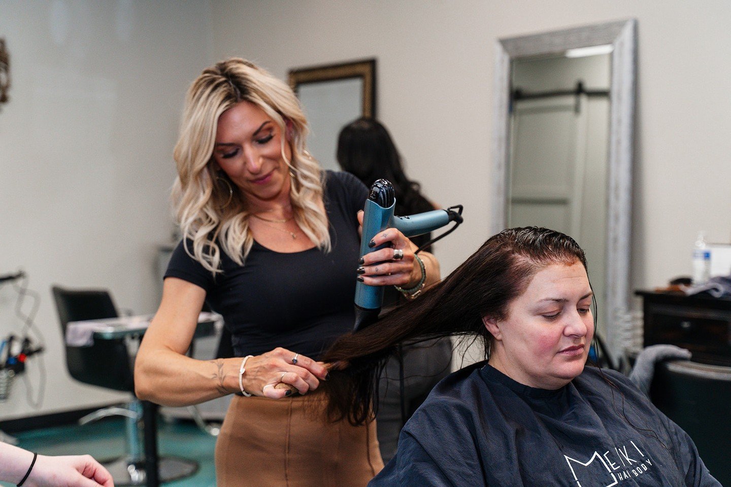 Blow dryers are really personal preference. Where the heating element sits, what attachments you're using, how you like to hold it. These things help determine which one you like to use and which one you should recommend to your client. 

What's your