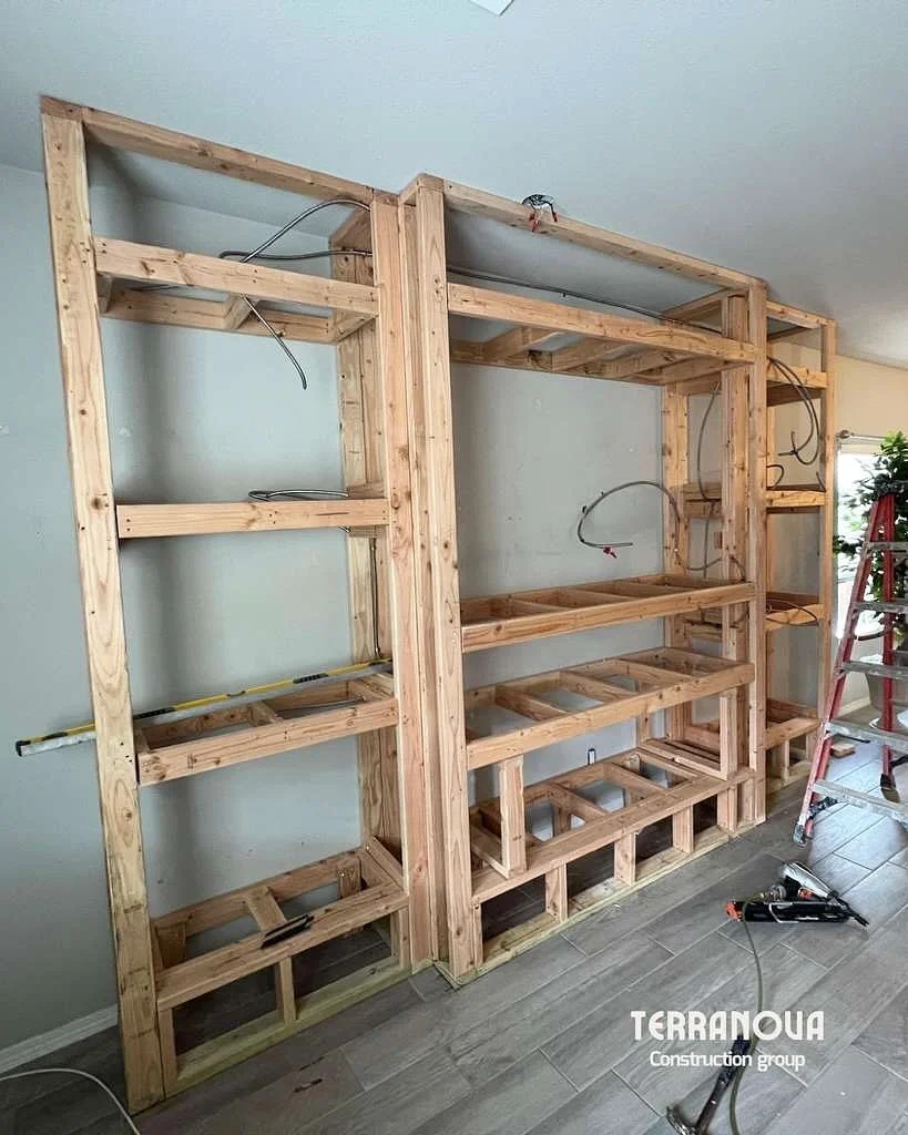 From a blank wall ➜ to a custom-built entertainment center 🔥

Designed and built by Terranova Construction Group, featuring recessed lighting, floating wood accents, and a modern electric fireplace.

Transform your living space into something beauti