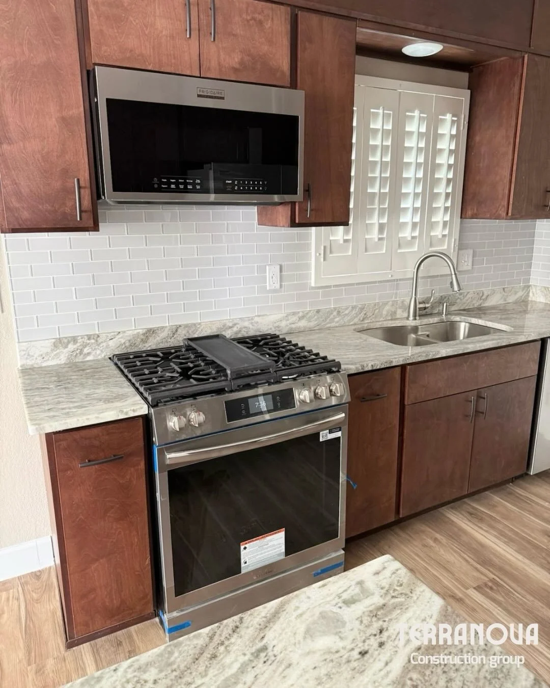 From custom ceiling-height cabinetry and quartz-style countertops to a clean subway-tile backsplash, updated lighting, and new stainless appliances, every detail in this kitchen was remodeled with care.

Proud to deliver another stunning transformati