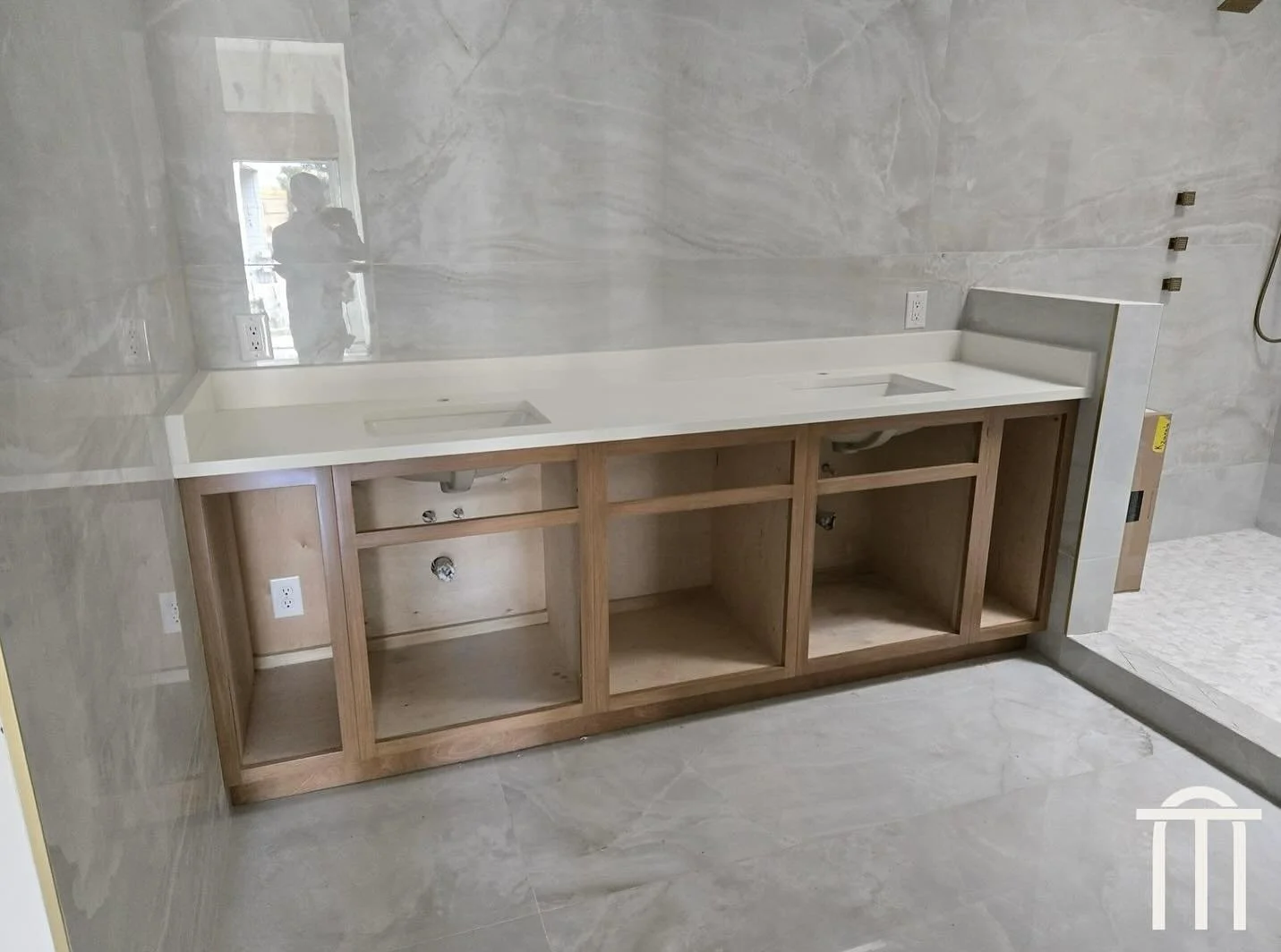 Sneak peek of a custom built bathroom ✨

Our team is bringing this custom double-sink vanity to life with seamless quartz tops, full height stone walls and custom cabinetry. One of our favorite projects so far! 

Stay tuned for the reveal. Contact us