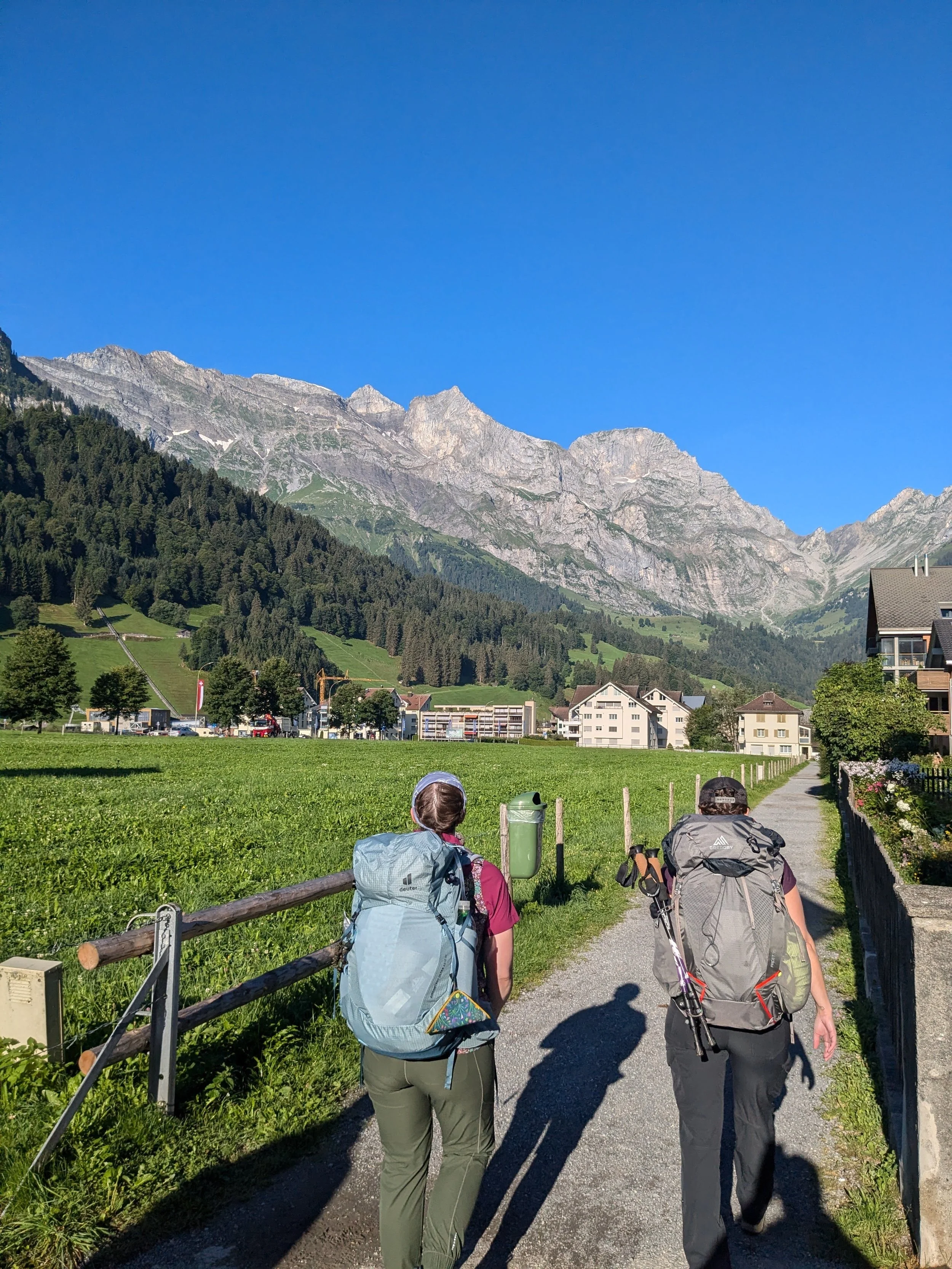 hiking on an inn-to-inn through hike in switzerland, 2 women, hiking backpacks gregory and deuter