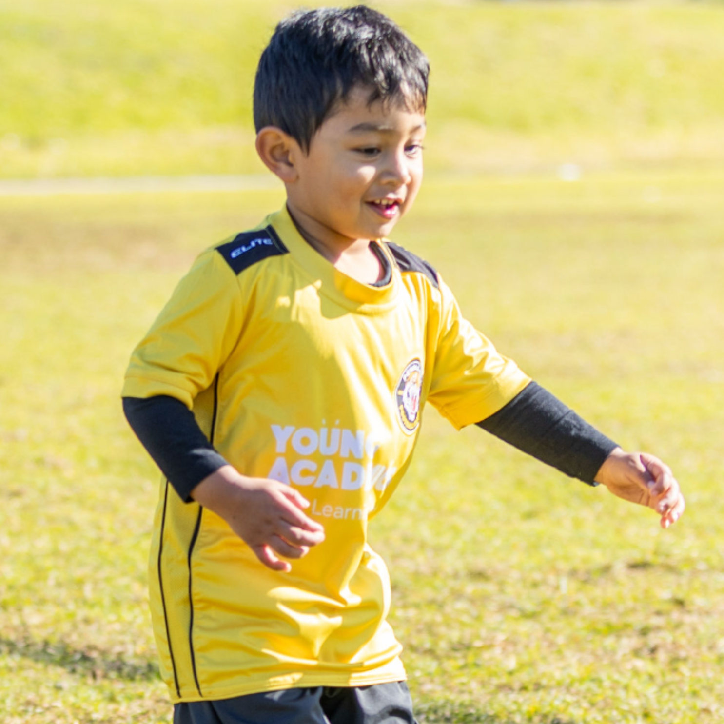 Young player at soccer program for preschool, 3 to 5 years. Safe and supportive local football programs.