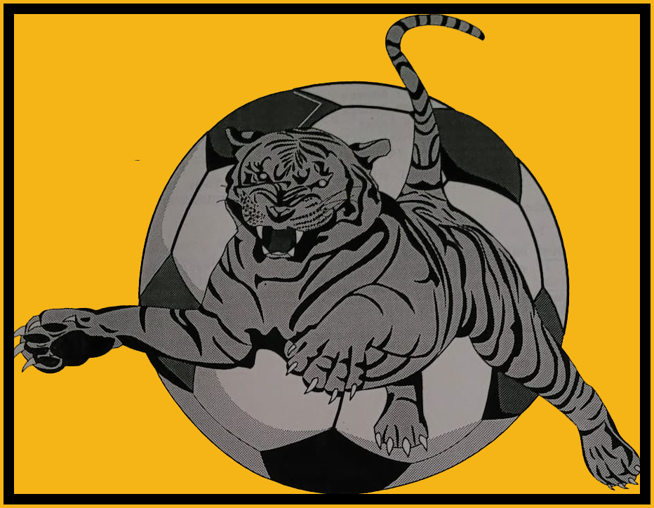 A stylized illustration of a tiger emerging from a soccer ball with a yellow background.