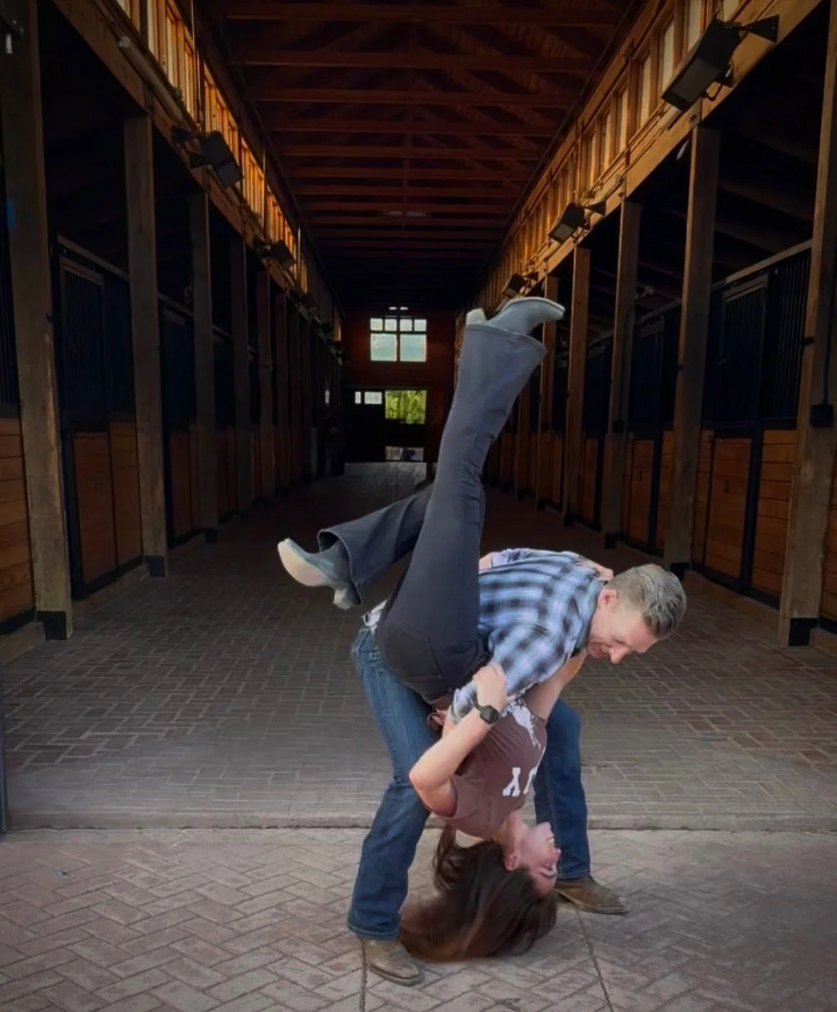 Couple learning Two-Step and country swing during an in-home private dance lesson