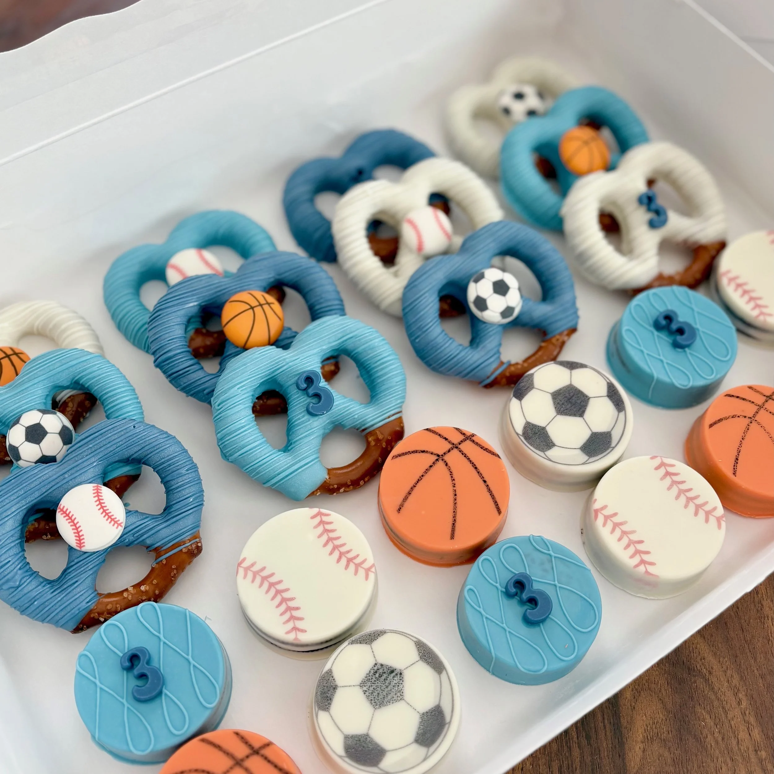custom sport themed chocolate covered pretzels and oreos