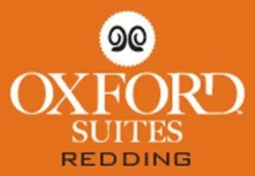 Oxford Suites Redding logo on an orange background. Image is a link to the corresponding company.