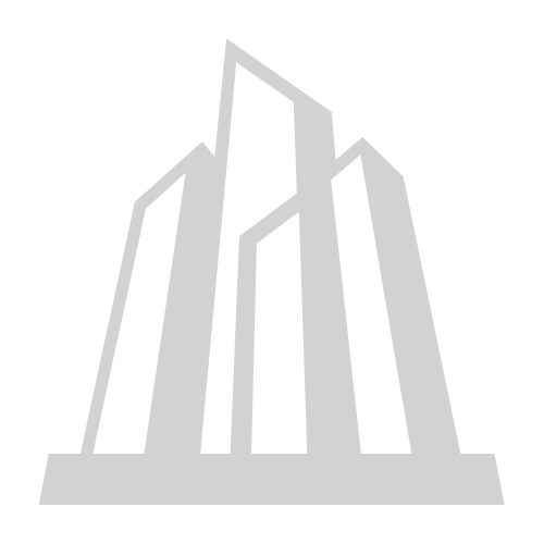 Stylized silver and black geometric illustration resembling a modern skyscraper or architectural structure.