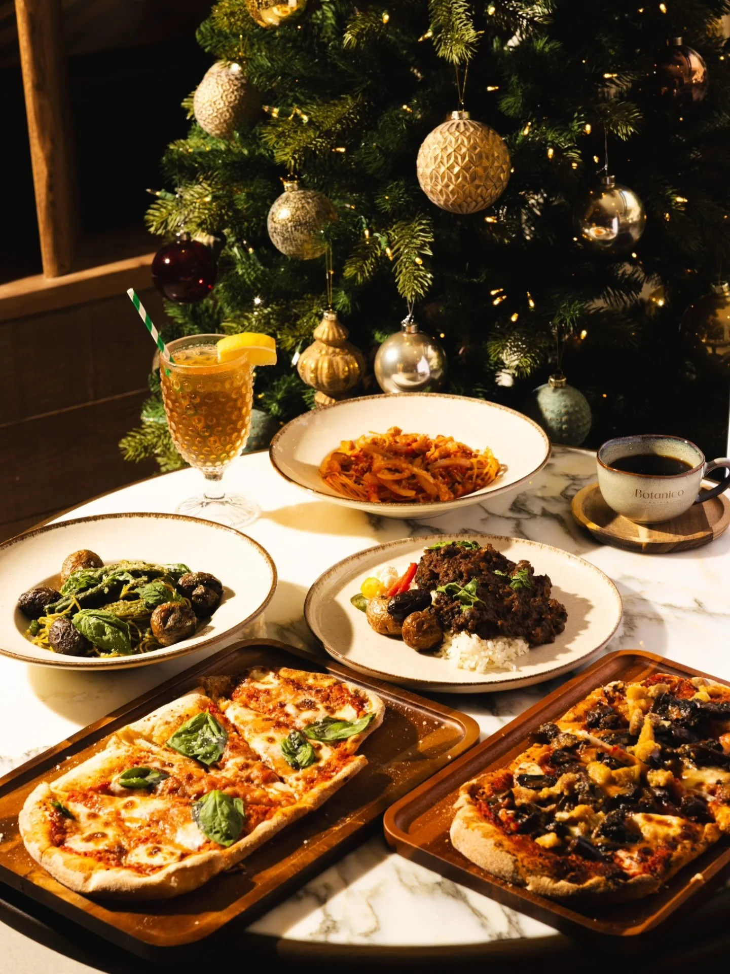 Step into a festive dining experience where comforting flavors meet elegant craftsmanship this holiday season.

Our seasonal offerings feature four artisan pastas, four signature pinsas, three thoughtfully crafted curries, and two vibrant salads, eac