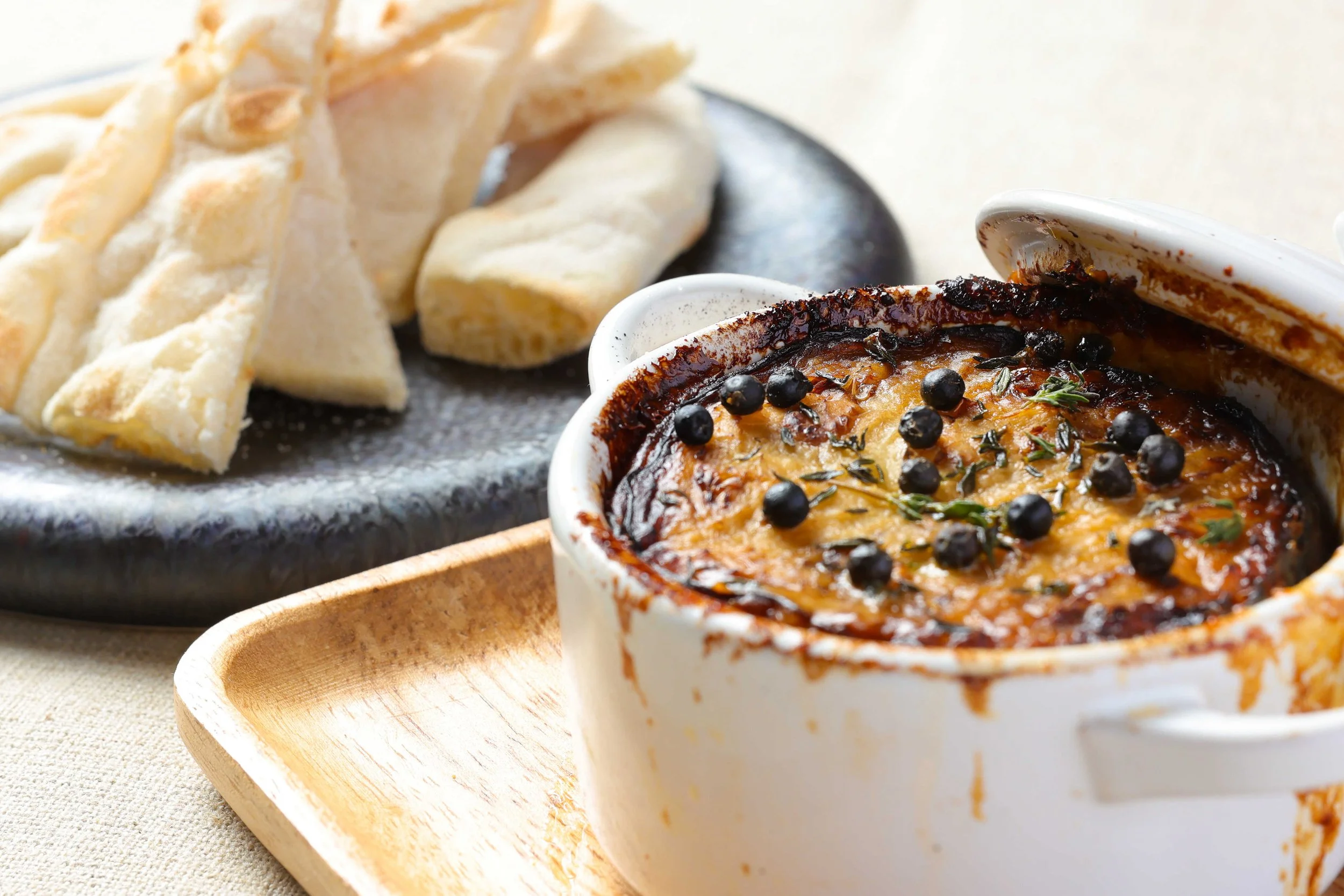 botanicowaikiki_Moussaka with Pinsa Bread.jpg