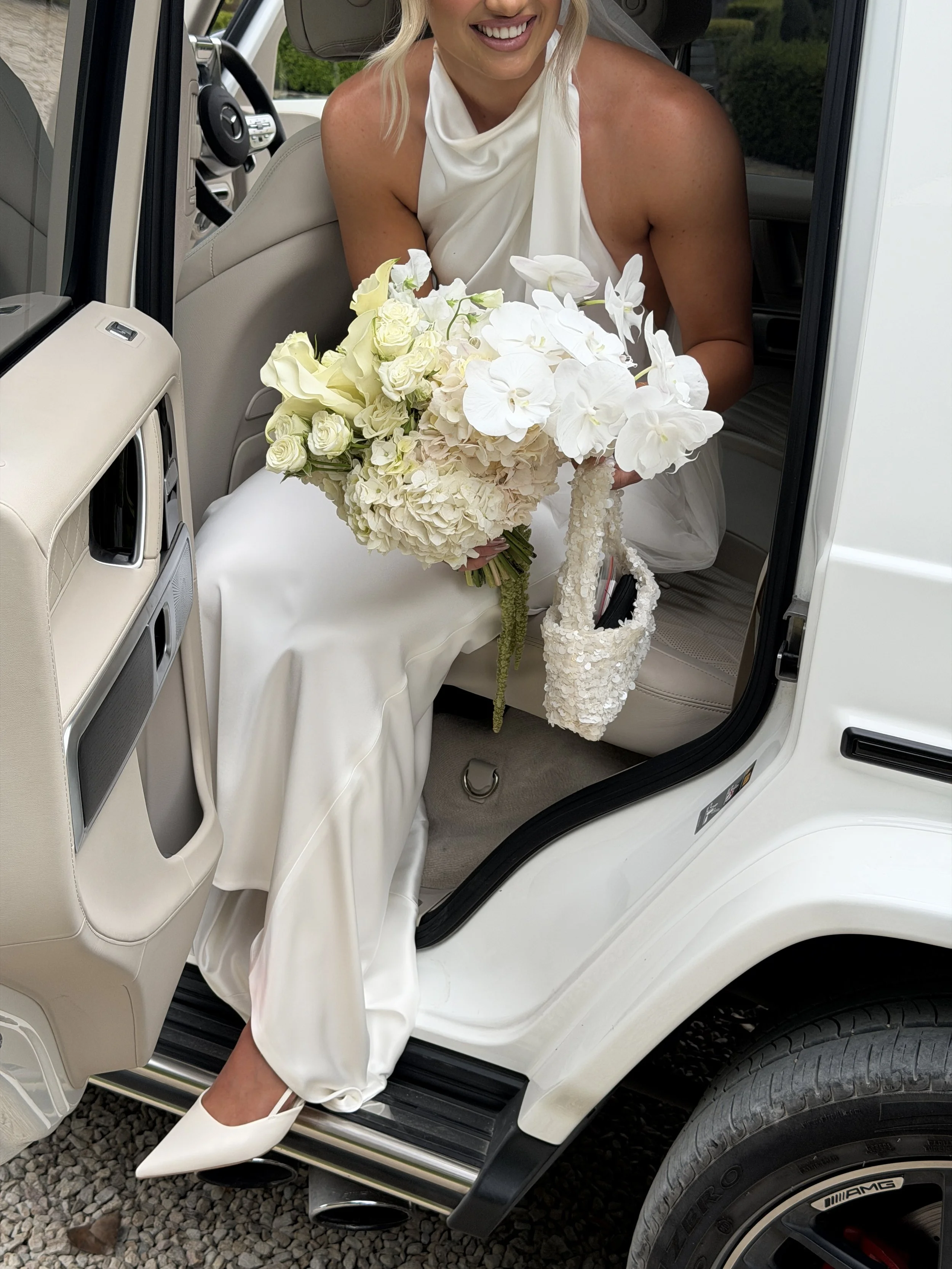 Wedding entrance, in expensive car, detailed shot