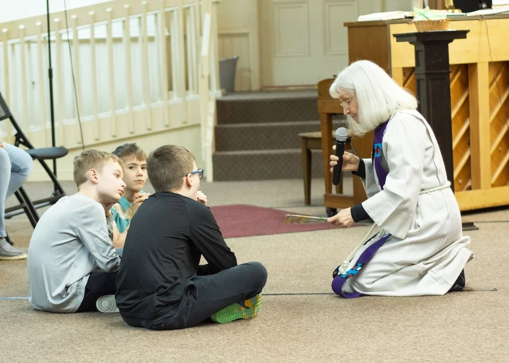 Kids time with pastor.JPG