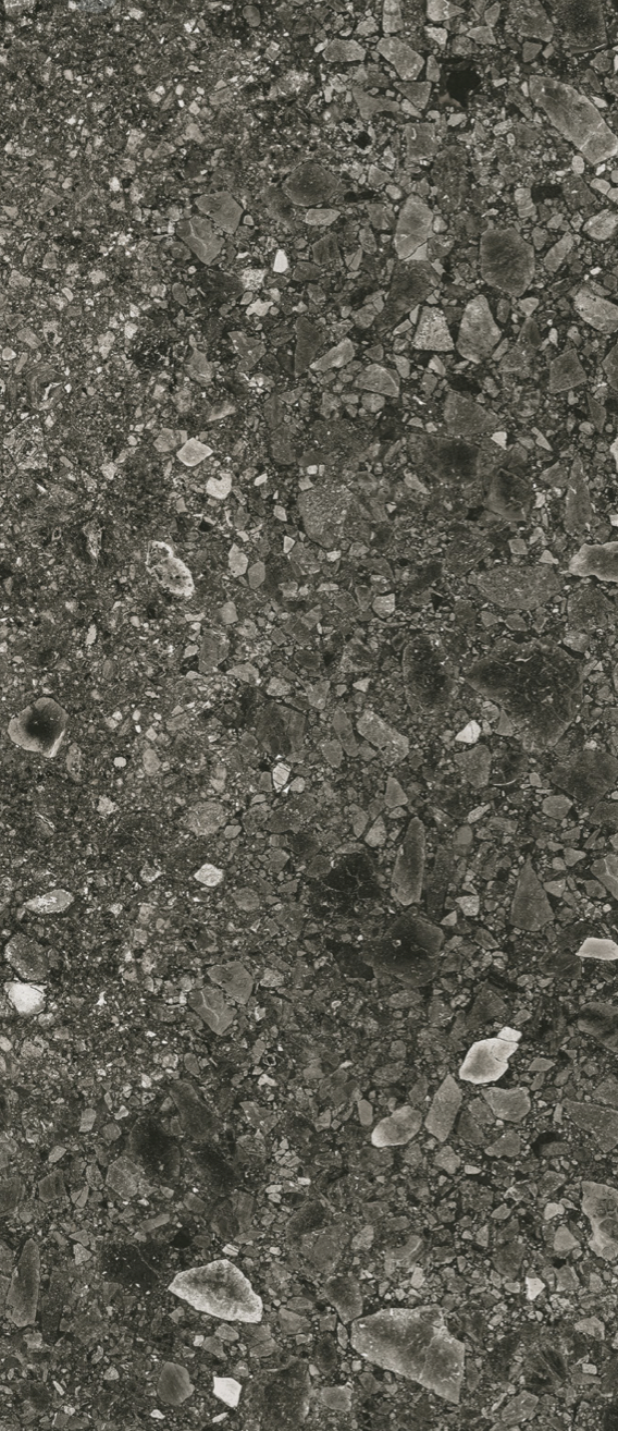 Schmutziger Asphalt mit Steinen und Staub