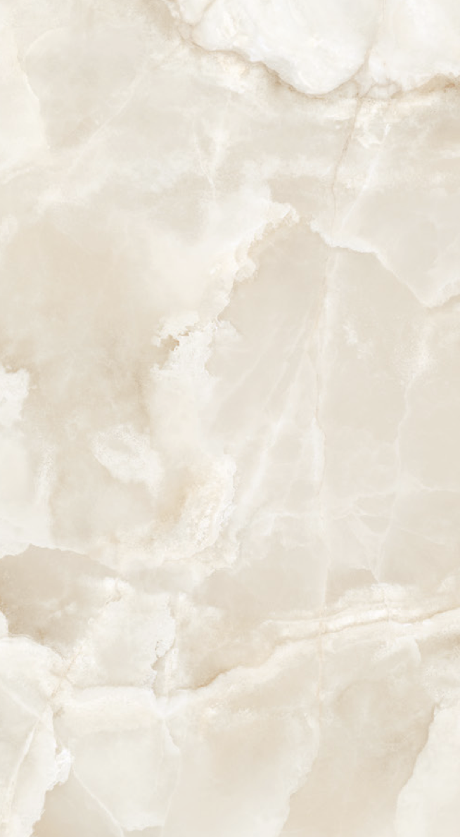 Nahaufnahme einer hellen, marmorierten Oberfläche mit cremefarbenen und weißen Mustern.