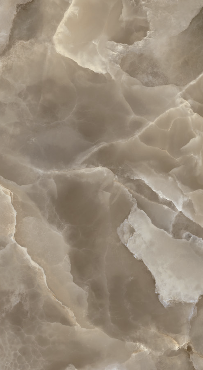 Marmorierte Oberfläche in Beigetönen mit weißen und grauen Adern.