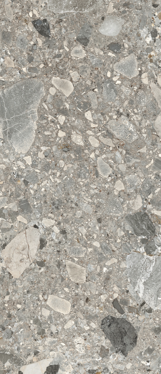 Bodenbelag aus grauem Marmor mit kleinen Steinen in verschiedenen Grautönen.