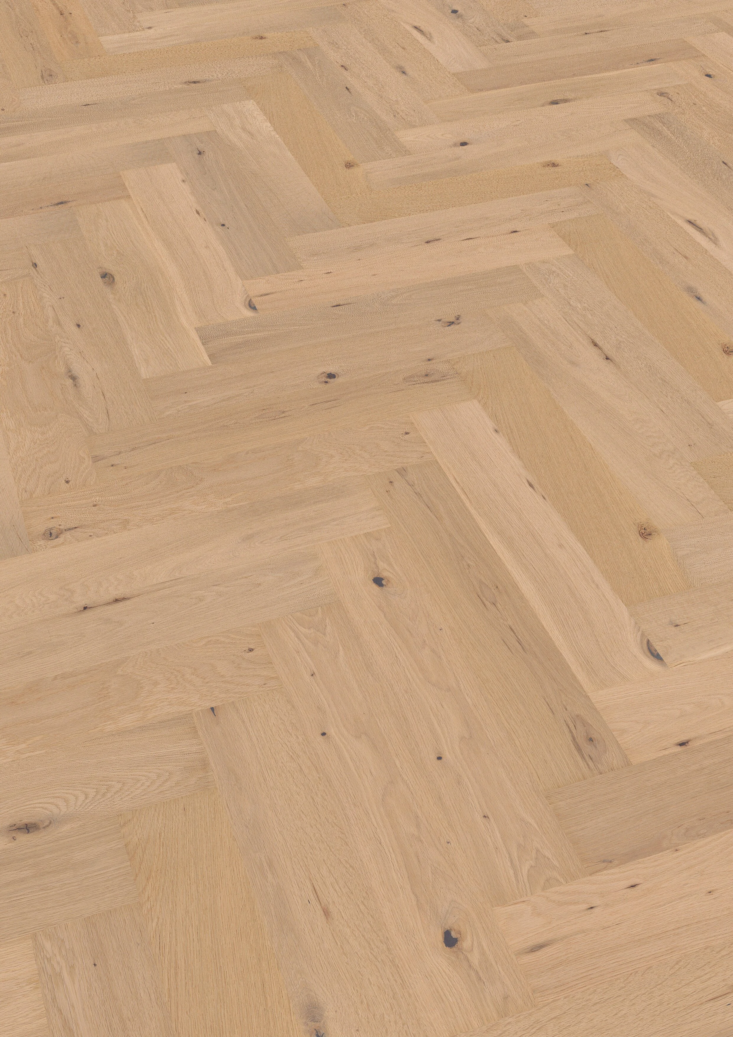 Nahaufnahme eines Holzboden mit gehobeltem Parkett in einem hellen Holzton.