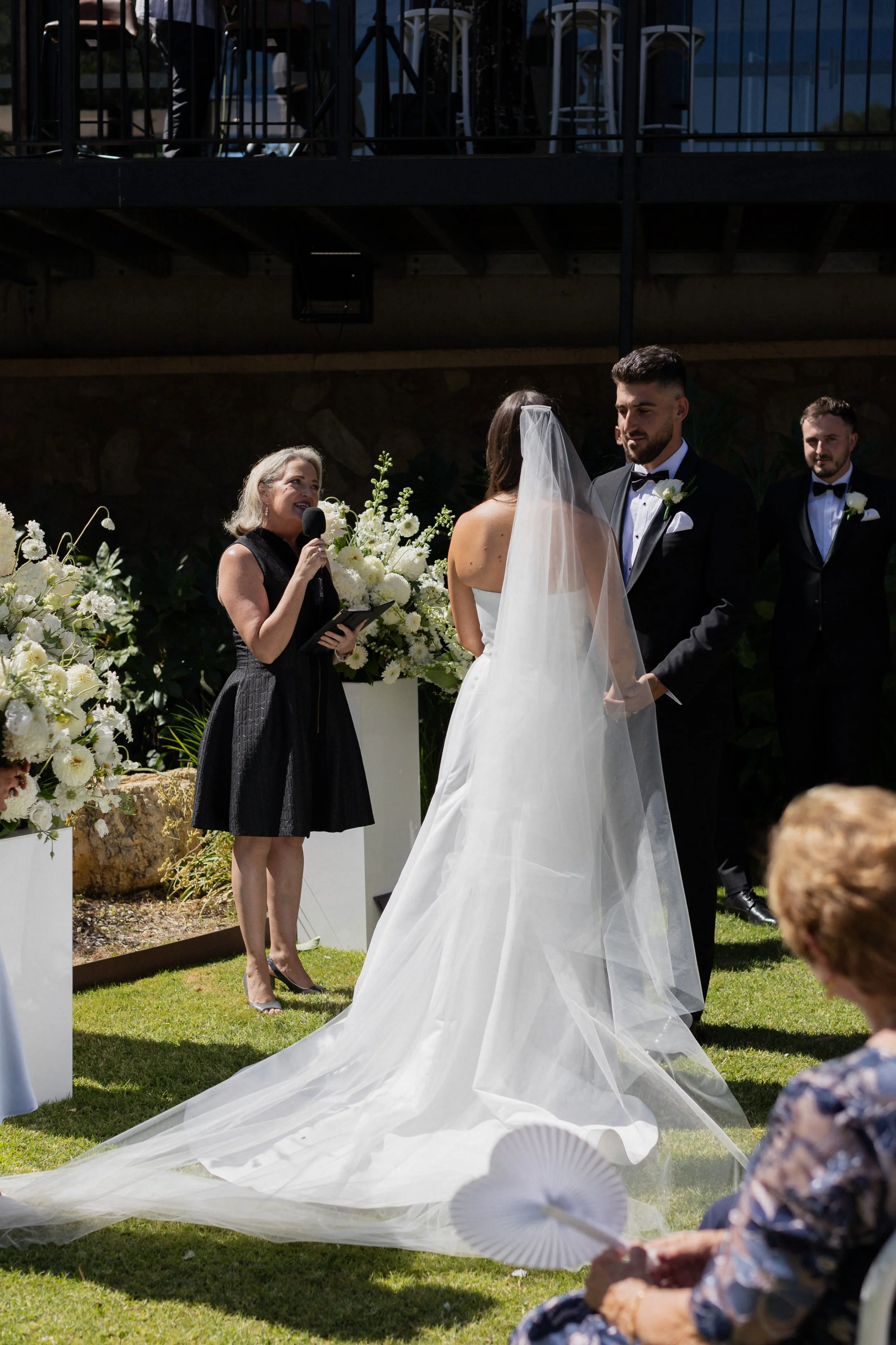 A celebrant marrying a couple