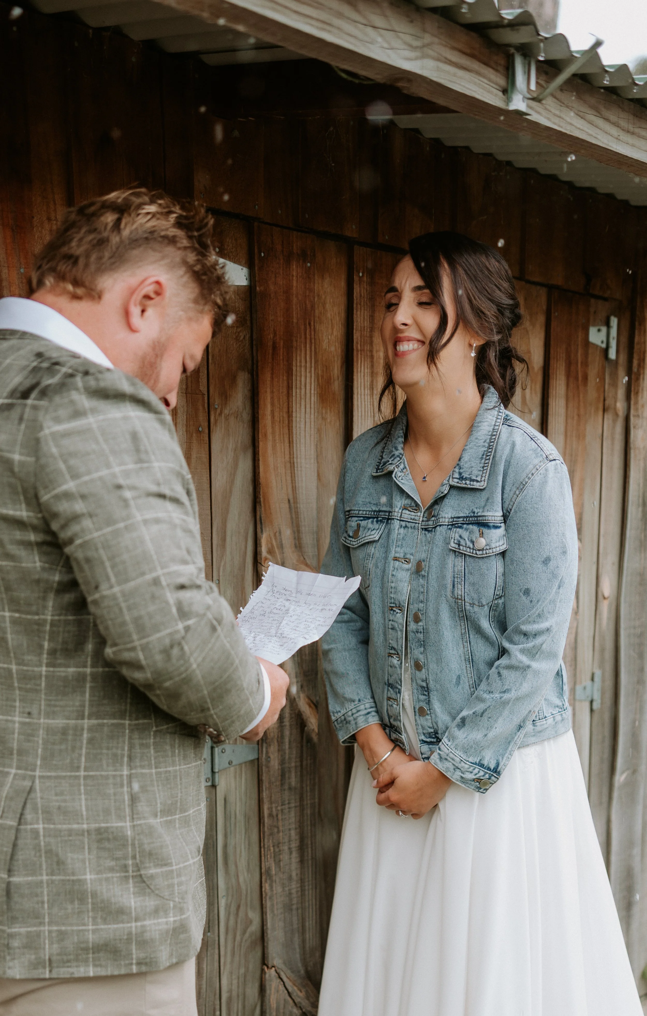 bride laughing at her husband