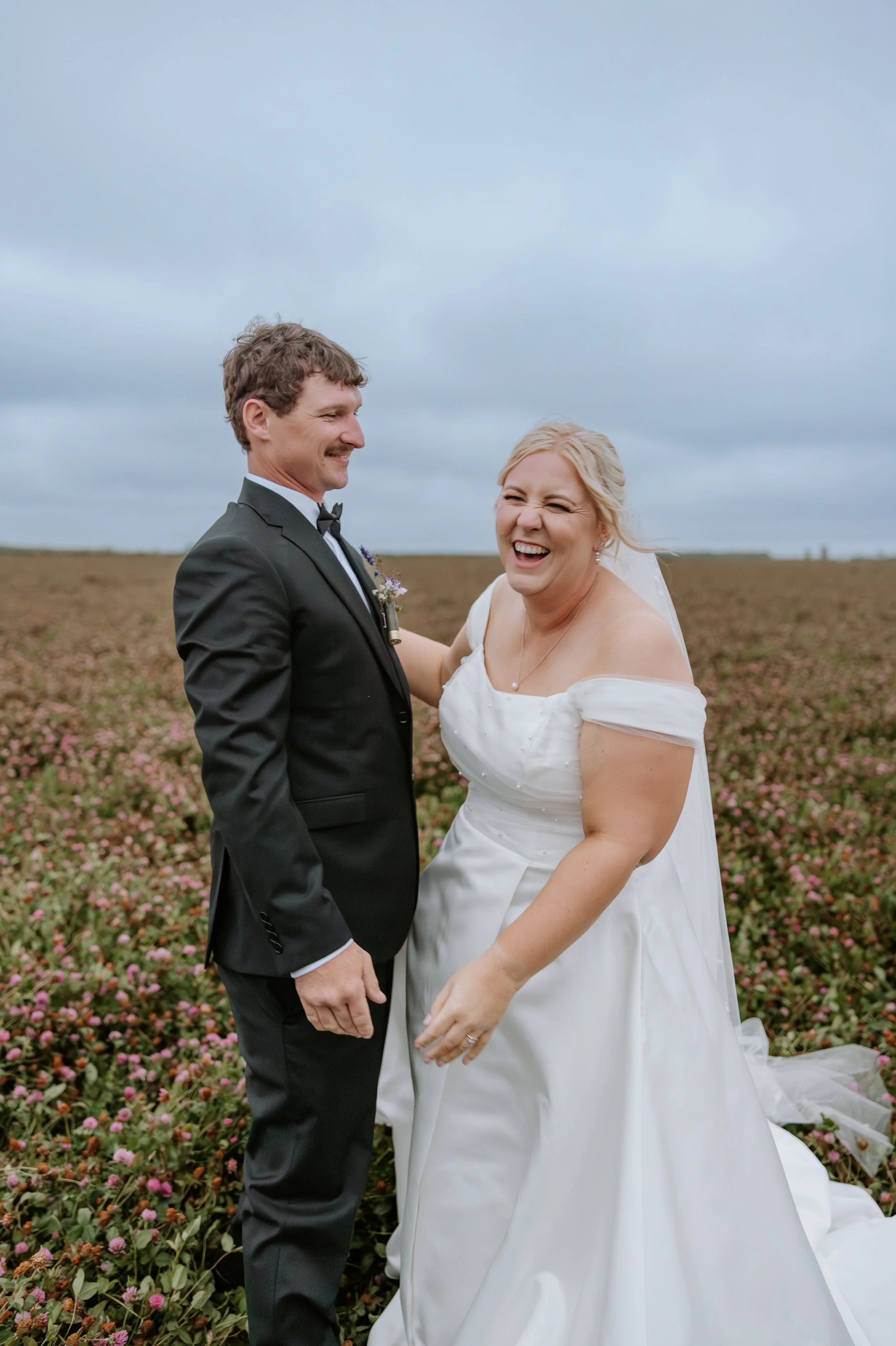 bride laughing with groom