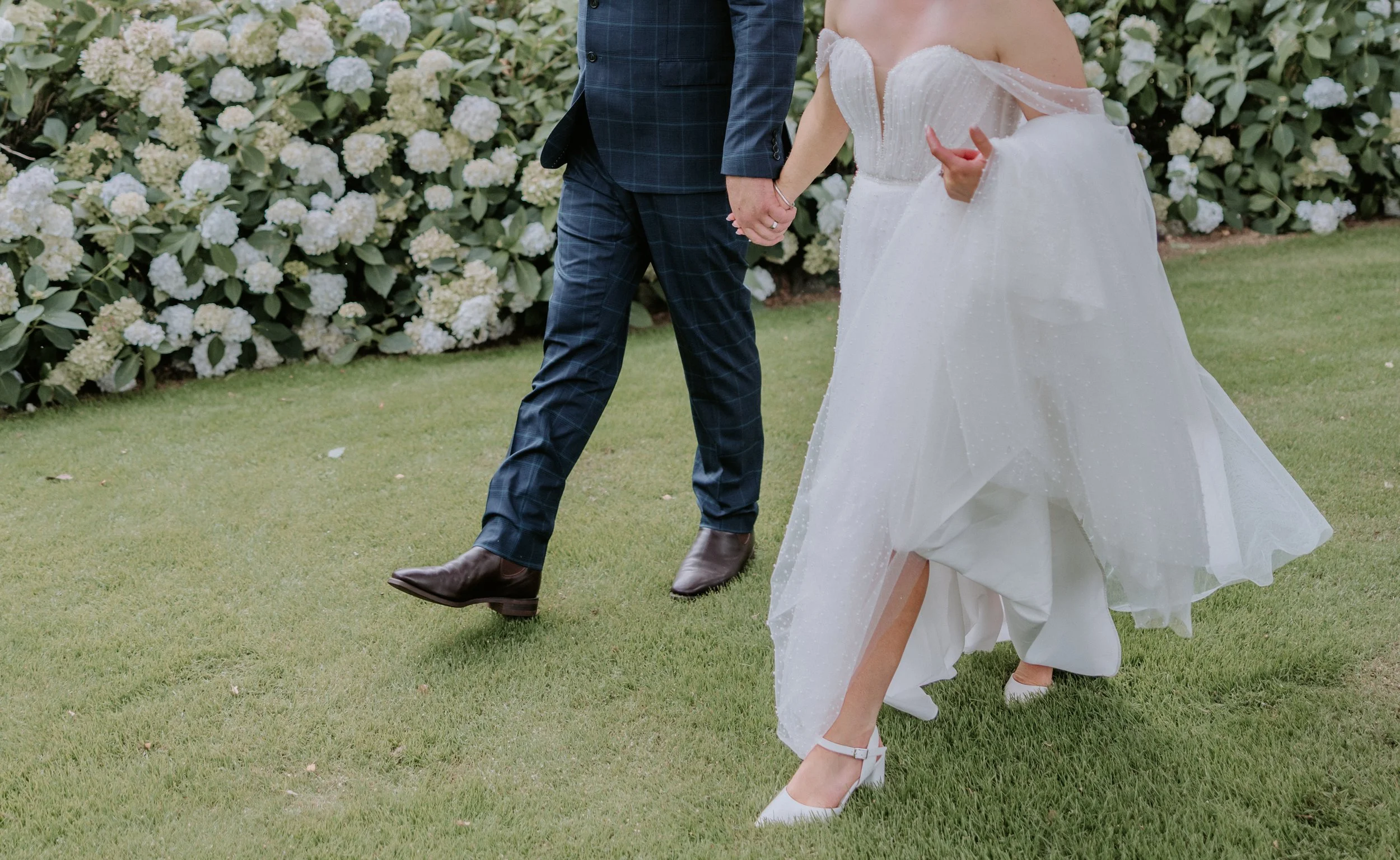 bride and groom walking