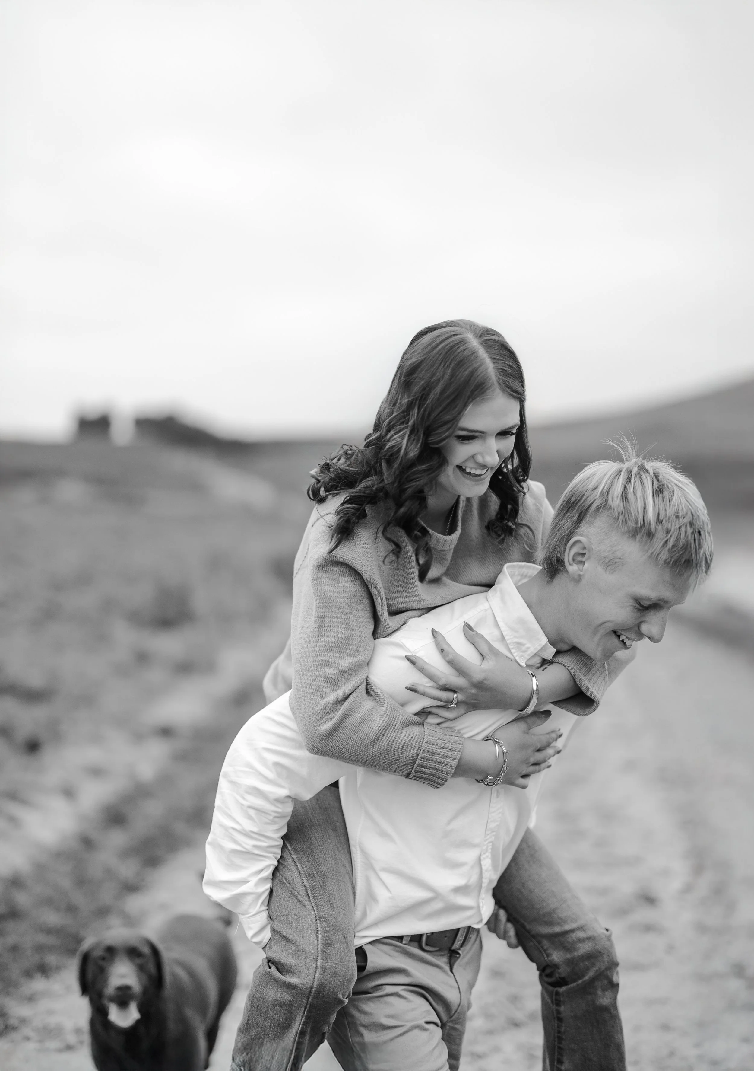 engaged couple laughing