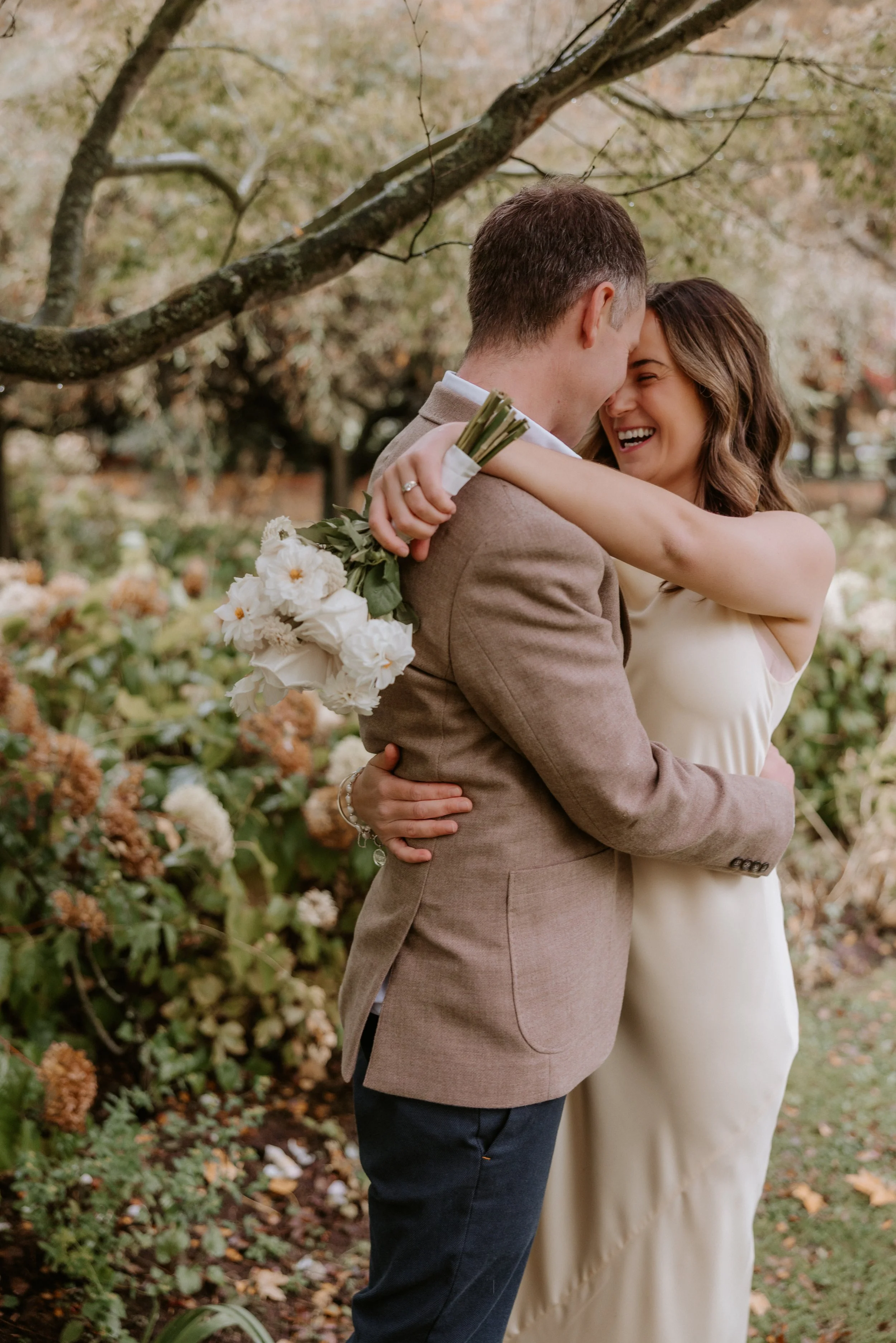 couple laughing during elopement