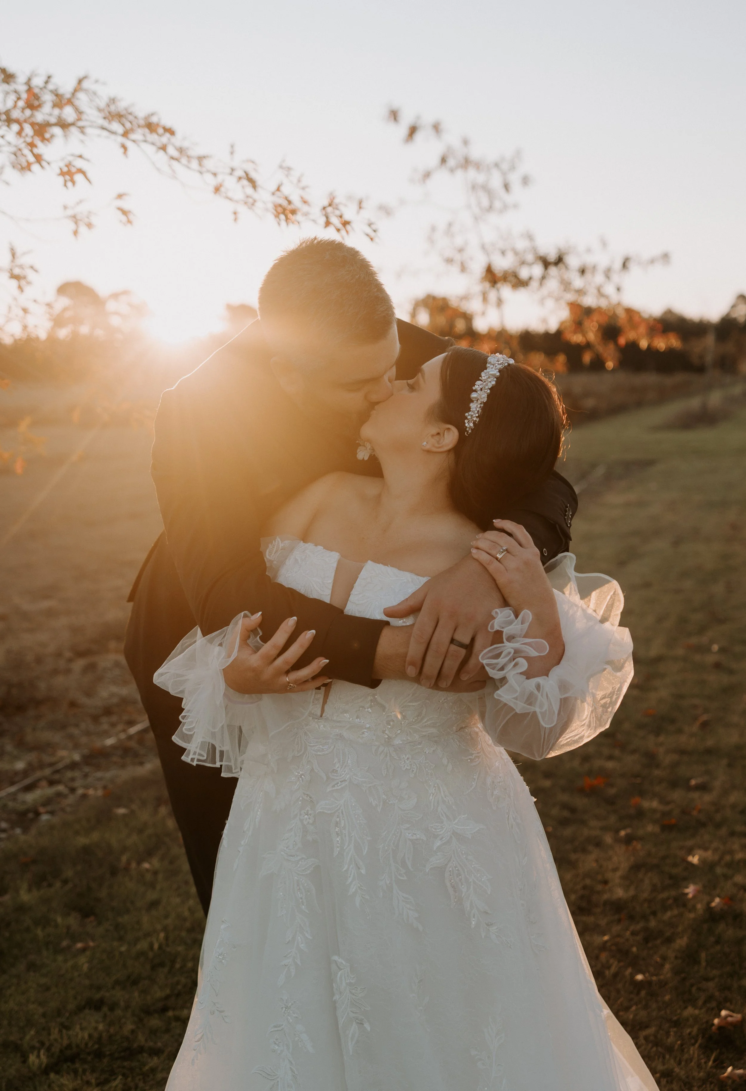 couple kissing during wedding