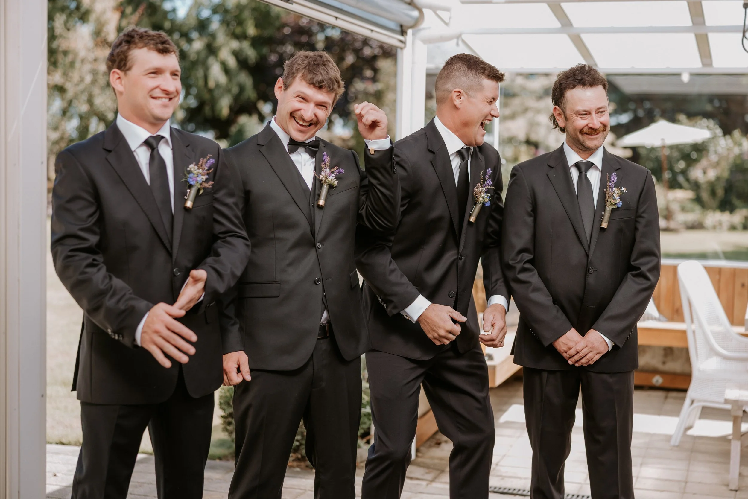 groomsmen laughing