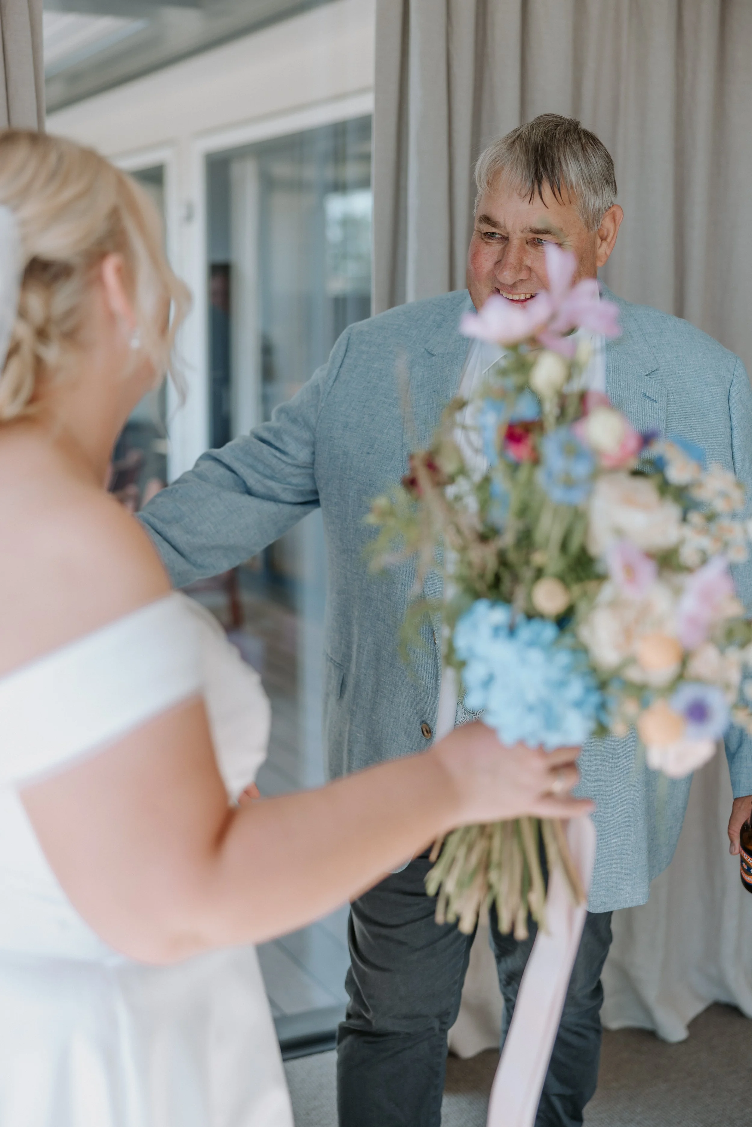 father reacting to bride