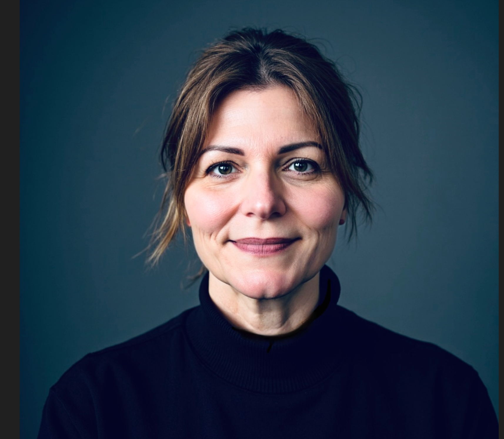 Close-up portrait of a woman with short, wavy brown hair, wearing a black turtleneck sweater, smiling softly against a dark grey background.