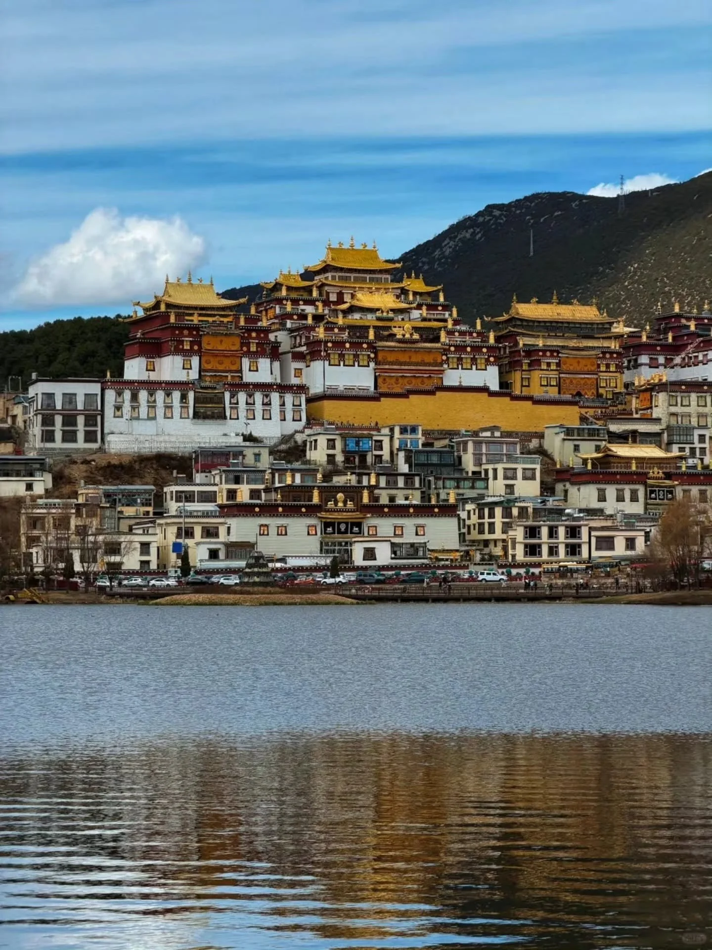 At 3,300 metres, the air may be thin but it gives the sky a colour of blue you can&rsquo;t get at sea level. 

Diqing sits on the Tibetan Plateau in northwest Yunnan. The grasslands stretch out to the mountains and yaks outnumber tourists. Back in 20