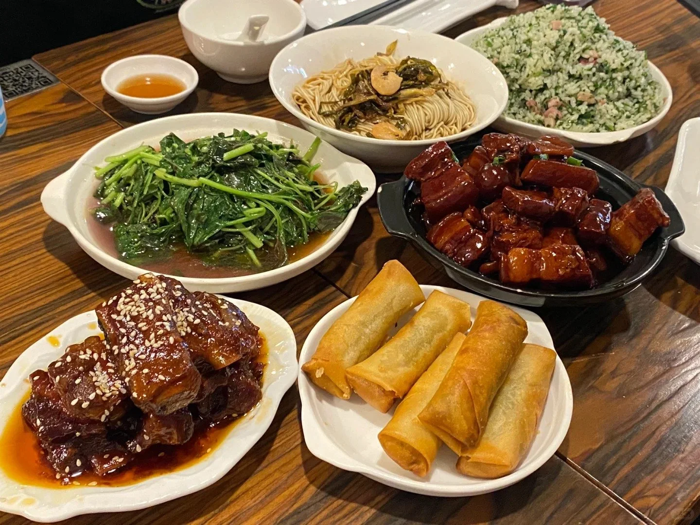 A table full of Shanghainese dishes at Jianguo 328