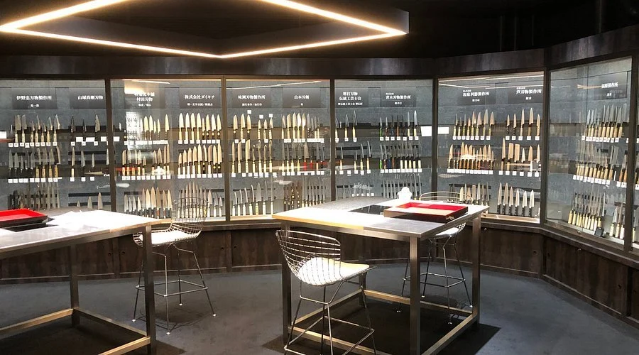 Knife display room at the Sakai Traditional Crafts Museum and Knife Shop, showing hundreds of knives from multiple craftsmen