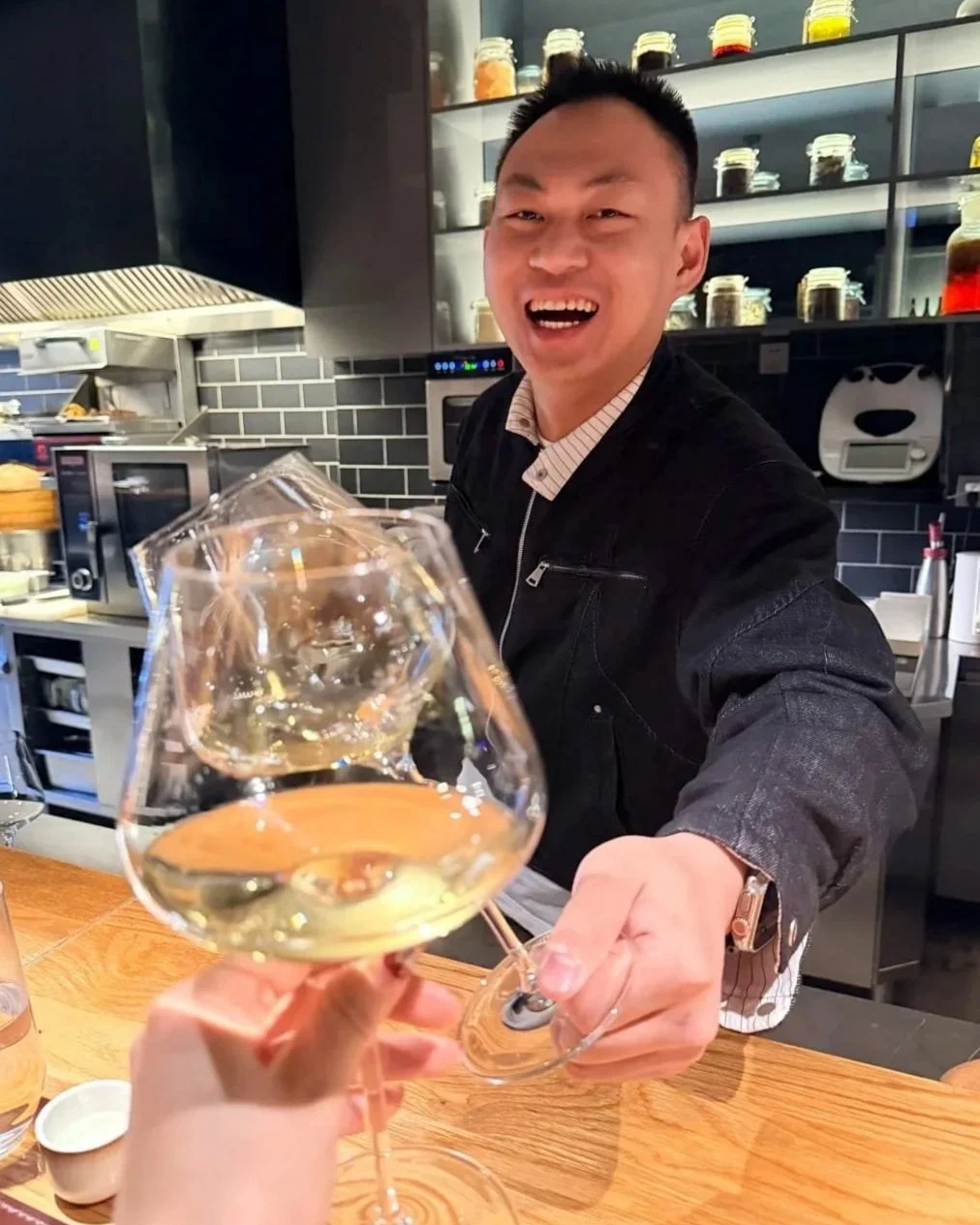 Cheers with Chef Ye Linhui at RAN The Chef's Table, a Black Pearl restaurant in Xiamen